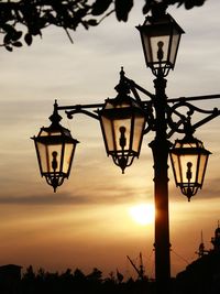 Low angle view of street light against sky