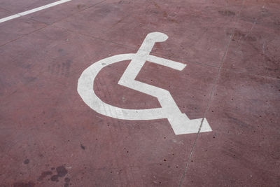 High angle view of wheelchair sign 
