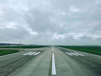 View of airport runway against sky