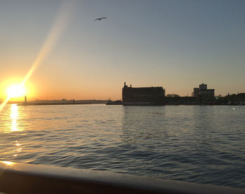 Scenic view of sunset over city