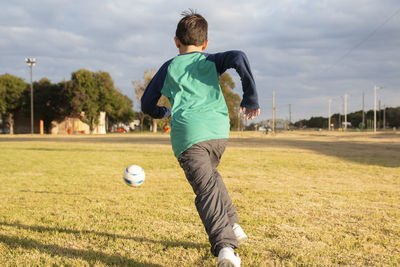 Portrait of child playing soccer