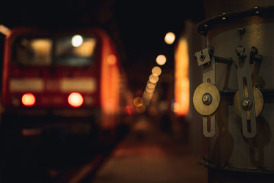 Close-up of illuminated lighting equipment at night