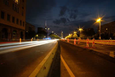 Light trails on city street at night