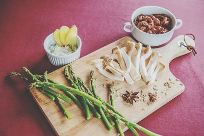 High angle view of vegetables on cutting table in kitchen