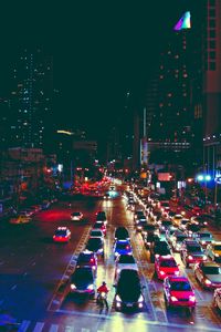 High angle view of traffic on city street at night