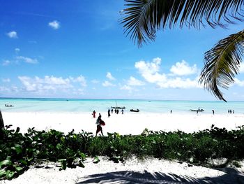 Scenic view of sea against blue sky