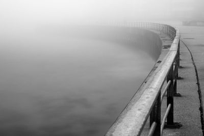 Pier over sea against sky