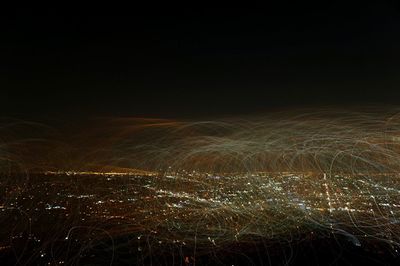 Aerial view of illuminated cityscape