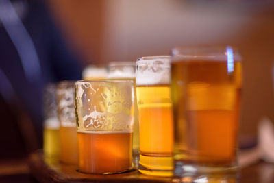 Low angle macro closeup of beer flight in bright sunlight