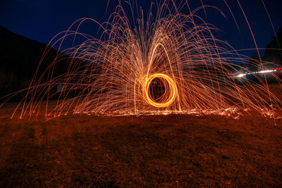 Light trails in sky at night