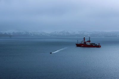 Scenic view of sea against sky during winter