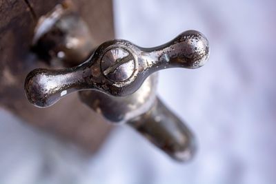 Close-up of water faucet