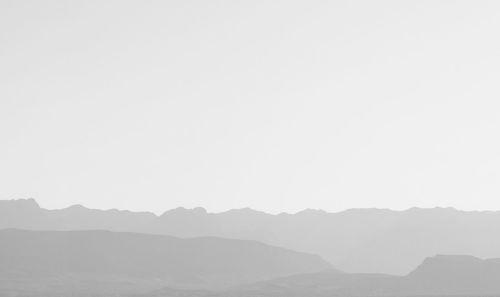 Scenic view of mountains against clear sky