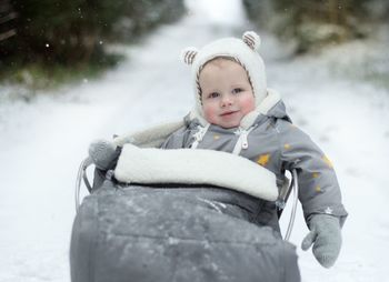 Portrait of cute girl in snow