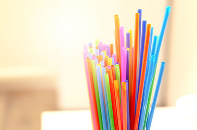 Close-up of multi colored pencils on table