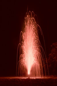 Firework display at night