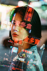 Close-up of woman behind glass board