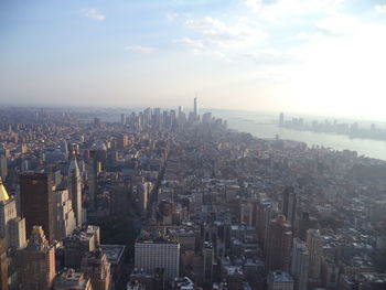 Aerial view of cityscape against sky