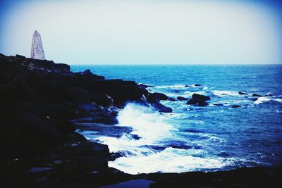 Scenic view of sea against clear sky