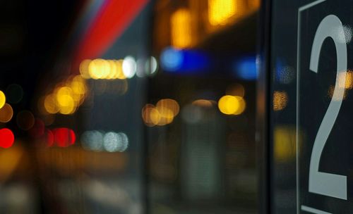 Illuminated lights in city at night