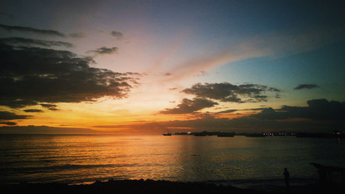 Scenic view of sea at sunset