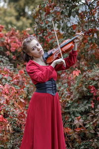 Young woman playing violin