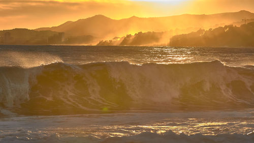 Scenic view of sea against sky during sunset