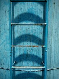 Close-up of blue metal ladder