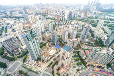 High angle view of modern buildings in city