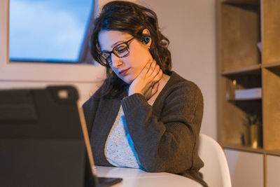 White woman working from home