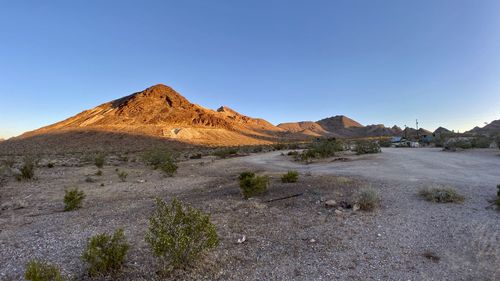 Scenic view of rocky mountains against clear sky