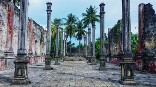 Walkway amidst buildings