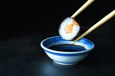 Close-up of sushi served on table