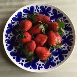 Directly above shot of strawberries in plate on table