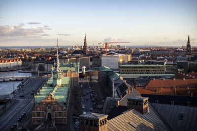 High angle view of city buildings against sky