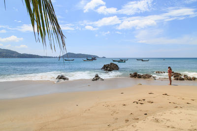 Scenic view of beach against sky