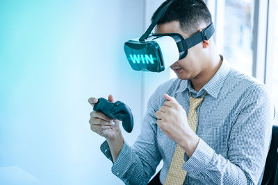 Young man using mobile phone