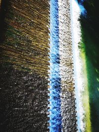 Full frame shot of multi colored water on field