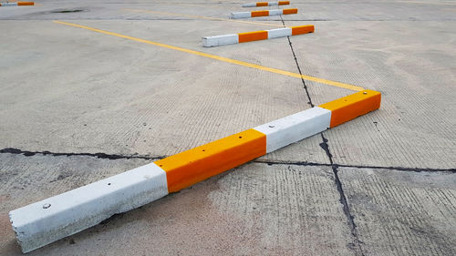 High angle view of yellow flag on road