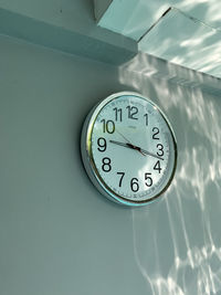 Clock at the side of the pool