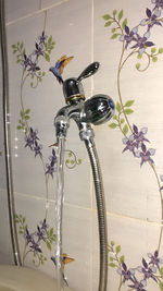 Bicycle parked against wall at home