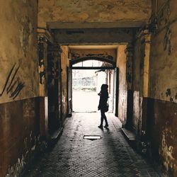 People walking in front of building