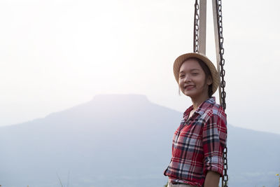 Happpy yoing girl at beautiful view point at phu pa po loei thailand.