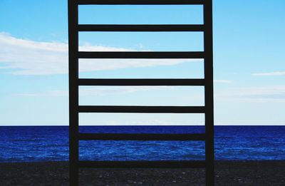 Scenic view of sea against blue sky