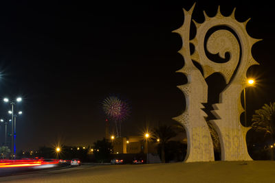 Illuminated street lights at night