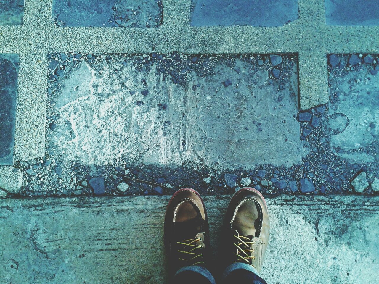 low section, person, shoe, personal perspective, water, human foot, standing, wet, part of, footwear, metal, built structure, lifestyles, men, close-up, unrecognizable person, day