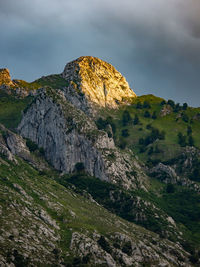 Rock formation on land against sky