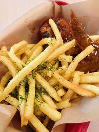 Close-up of meat and fries