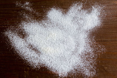 Close-up of ice cream on wood