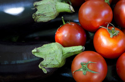 Close-up of tomatoes and eggplants